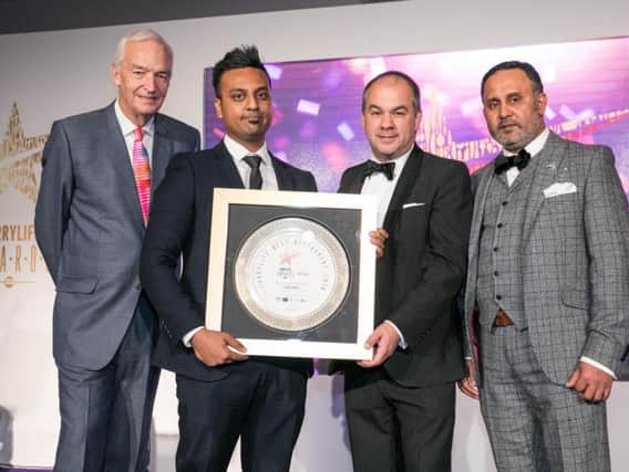 Winning combination: Mr Jon Snow, Mr Amran Ali, Manager for Don Restaurant, Mr Paul Scully MP and Mr Emdadul Hoque Tipu from Unisoft Solutions pictured at the awards event
