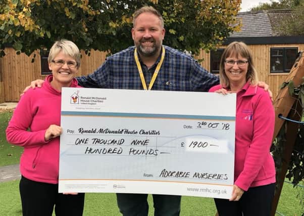 Adorable Nurseries raise funds for Ronald McDonald House Charities - deputy nursery manager Nikki Torrie, community fundraiser Nathan Swift and nursery manager Sue Casebrook.