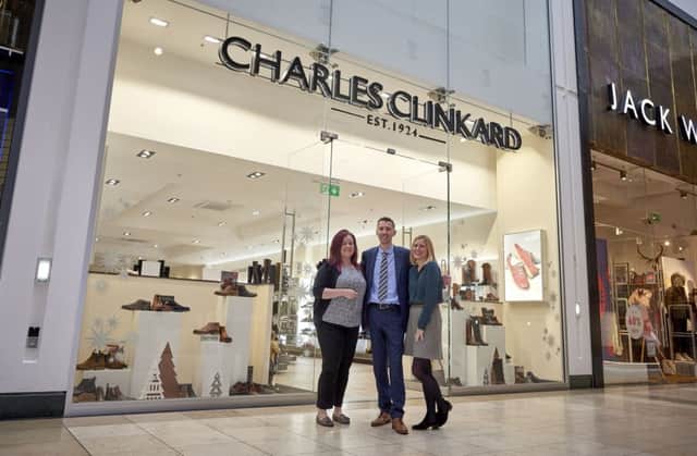 Store manager Oliver Lord outside Charles Clinkard