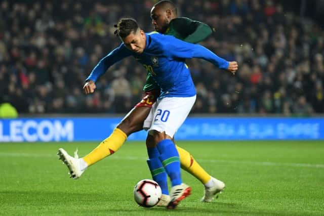 Roberto Firmino in action for Brazil