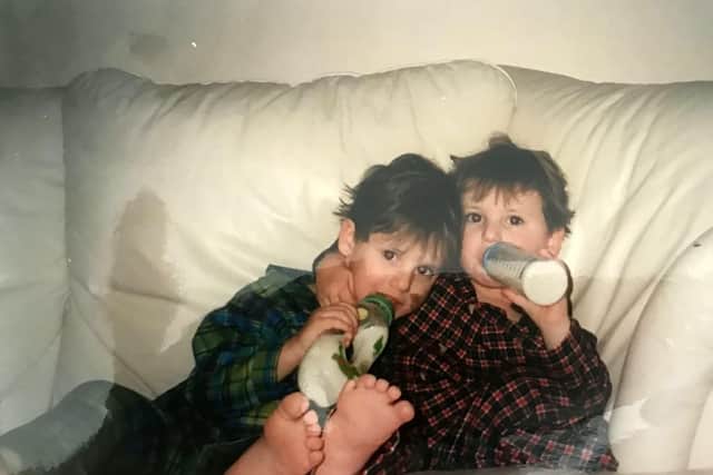 James and twin brother Tom as kids
