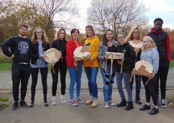 Milo Mcloughlin-Greening with MK College students and their handmade CC stools oP8H4iTuFiSYhx9eiQFd