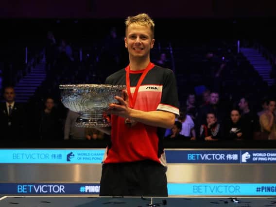 Andrew Baggaley celebrates his World Ping Pong title win