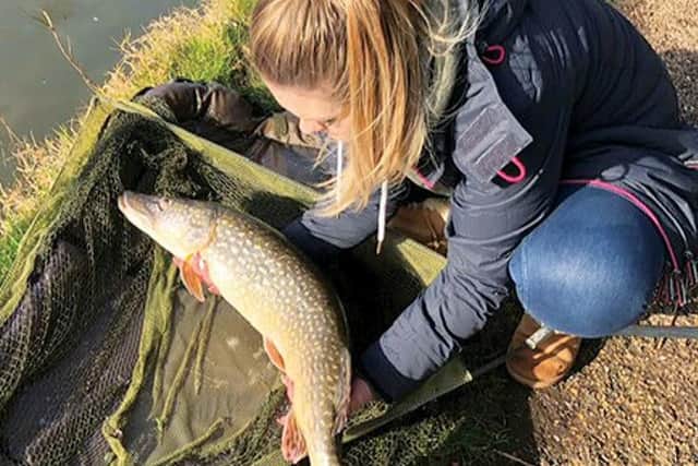 NIKKI Bolton with double-figure canal pike