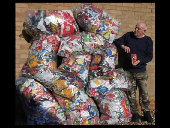 George Thomson has turned his Cantle Avenue home into a collection point for the offending wrappers, which he sends back to Walkers in exchange for a goodwill donation for local charities.