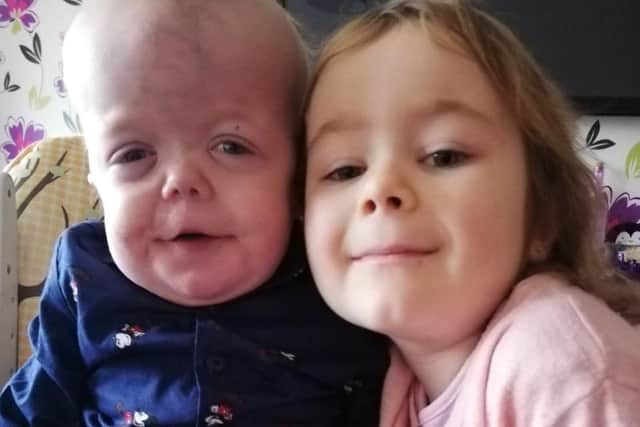 Little Rhys Dean, pictured with his sister Cerys