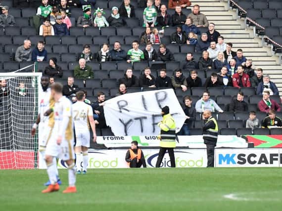 Yeovil fans with a banner reading 'RIP YTFC'