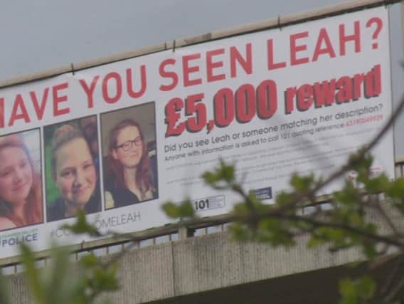 Banner offering 5,000 reward for information on Leah Croucher's disappearance