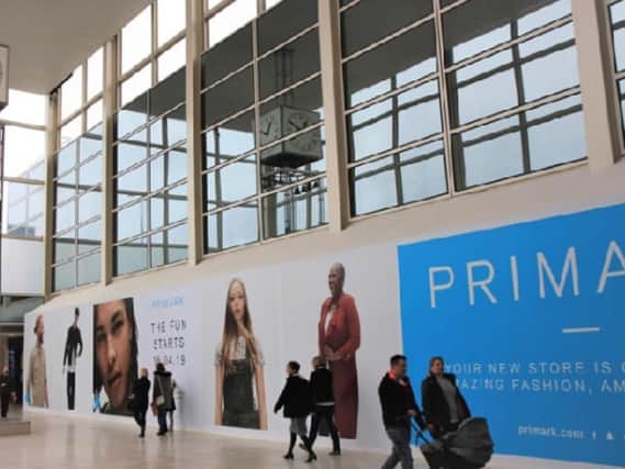 The hoarding comes off as MK's new Primark opens