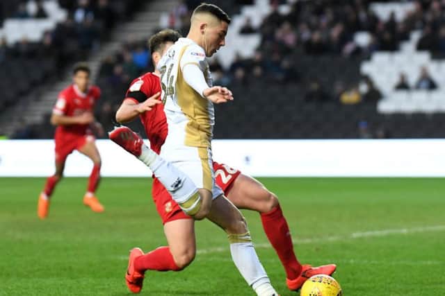 Walker made his Dons debut against Swindon