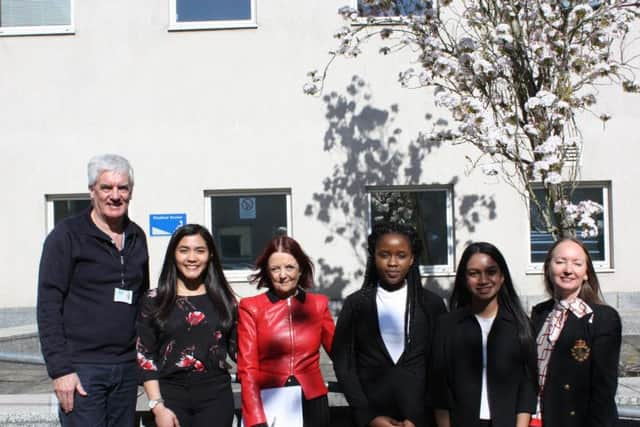 University of Buckingham students with Jocelynne Scutt and the university's employability manager Julie OShea.