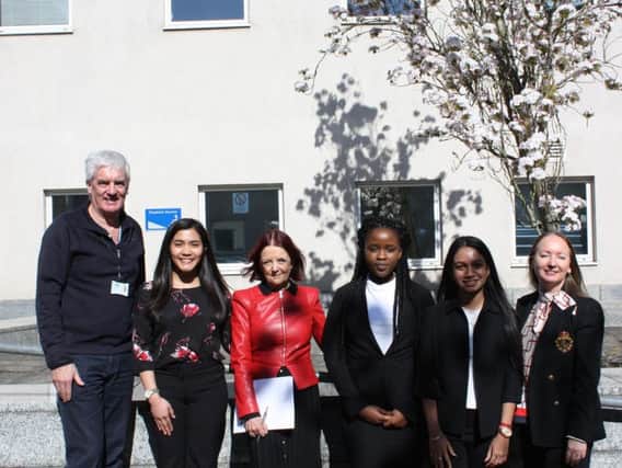 University of Buckingham students with Jocelynne Scutt and the university's employability manager Julie OShea.