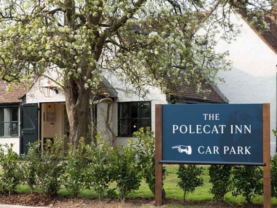 Outside the renovated and uniquely named Polecat Inn