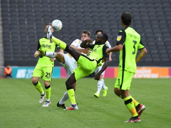 Boateng played in Exeter's 1-0 defeat at Stadium MK last season