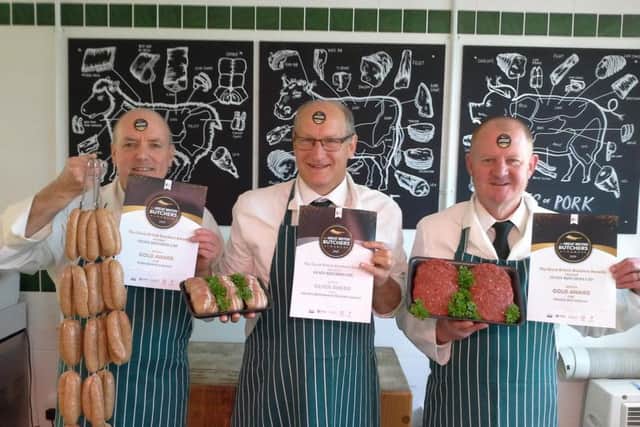 The butchers celebrate their award
