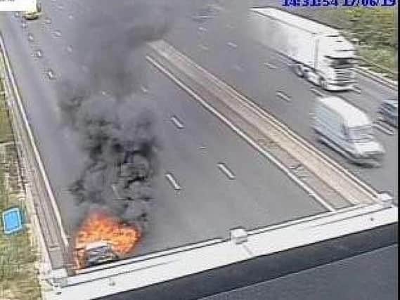 Highways released this CCTV image showing the car fire on the M1