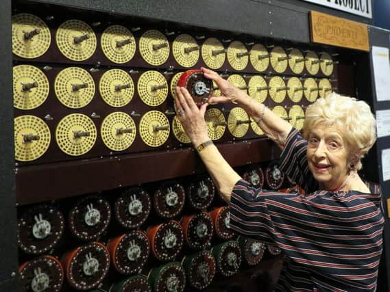 Ruth Bourne operating the Bombe.