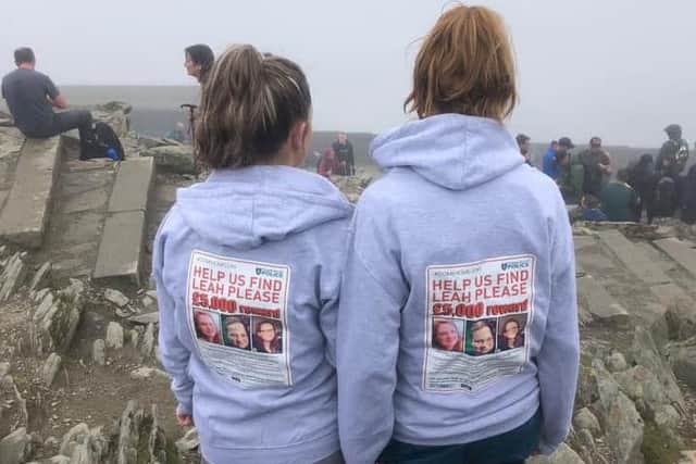 Jade Croucher and friend with hoodies emblazoned with Leah's 'missing' poster