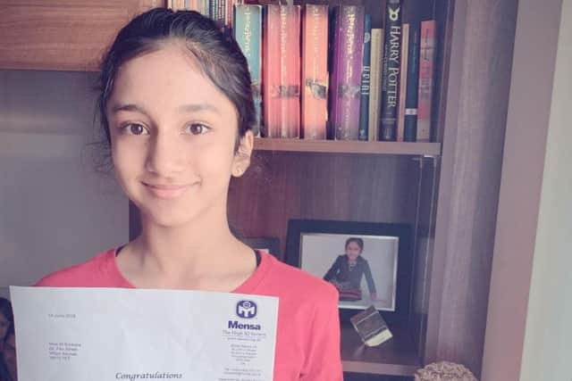 Moksha Sunkara with her IQ certificate