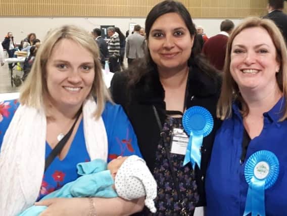 Cllr Jenkins, left, with baby Freddie at the election count in May