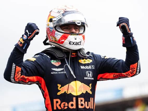 Max Verstappen celebrates his German GP win