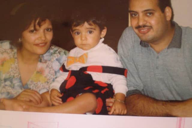 Ayman with his parents