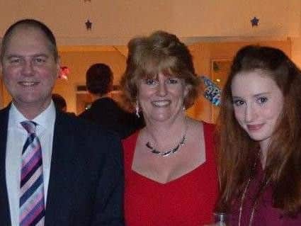Alana Cutland with her parents Alison and Neil