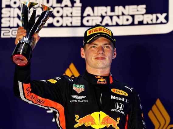 Max Verstappen on the podium in Singapore
