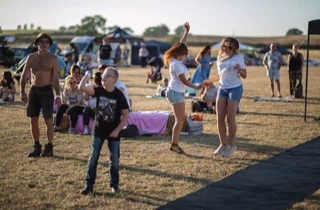 Crowds enjoy dancing to the music at the first ever HopeFest in Linslade