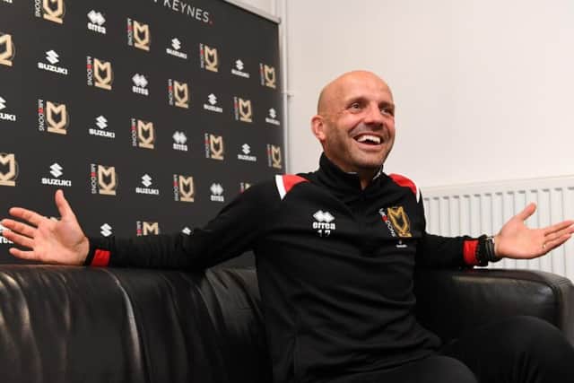 Paul Tisdale admits he didn't see the Liverpool manager put the flat-cap on