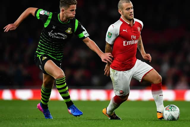 Houghton played for Doncaster against Arsenal in 2017