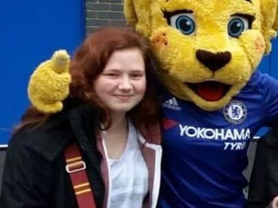 Chelsea fan Leah with the club's mascot