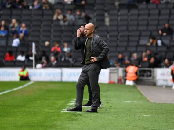 Paul Tisdale watches his side during their 3-0 defeat at the hands of Burton Albion on Saturday (Picture: Jane Russell)