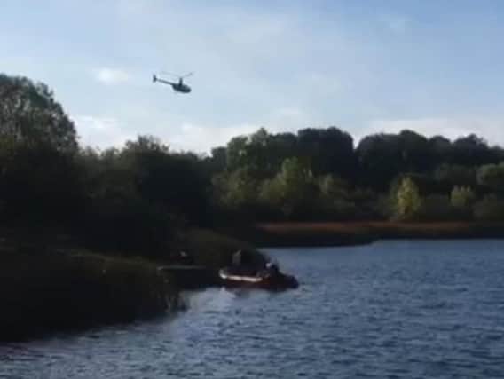 Helicopter and diving team at the scene