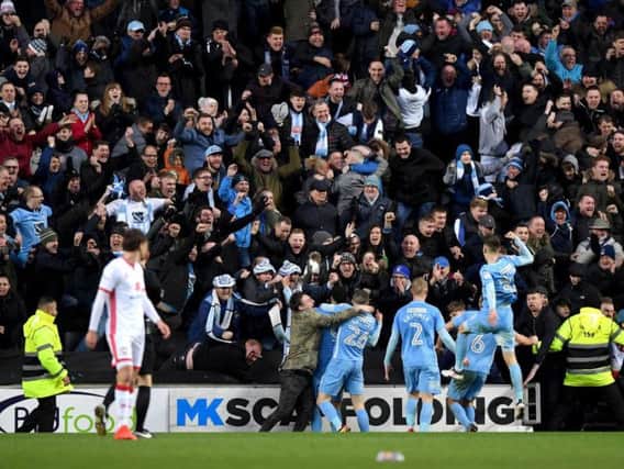 Coventry City supporters celebrate the only goal of the game during their 1-0 win at Stadium MK in January, 2018