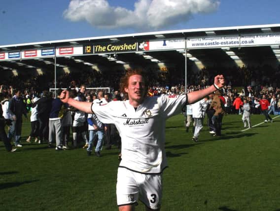 Dean Lewington celebrates the win over Tranmere in 2005