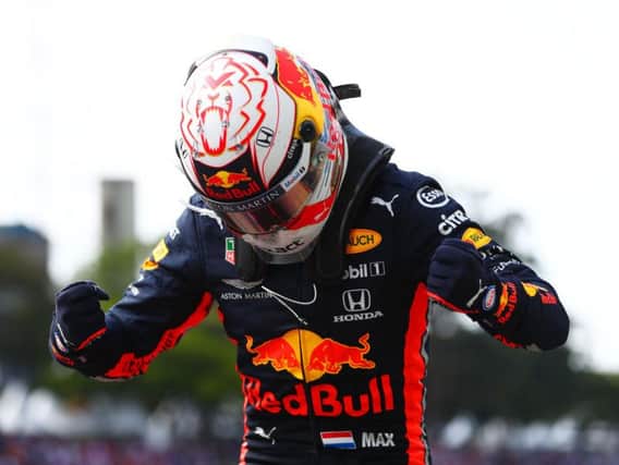 Max Verstappen celebrates his Brazilian GP win