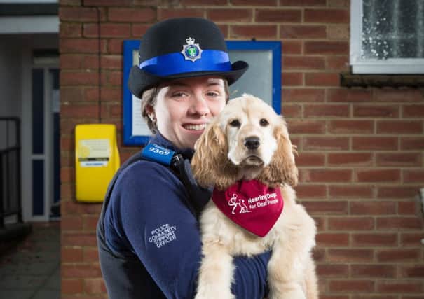 PCSO Claire Davis with Anya a hearing dog puppy