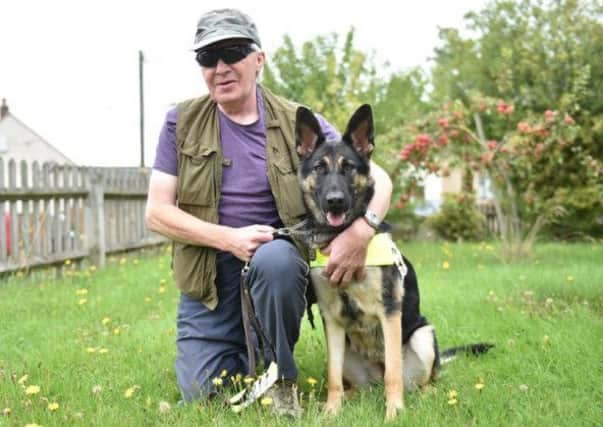 Mike Gurney with Emma, his guide dog