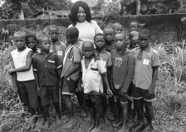 Christy Amalu with the children in Nigeria
