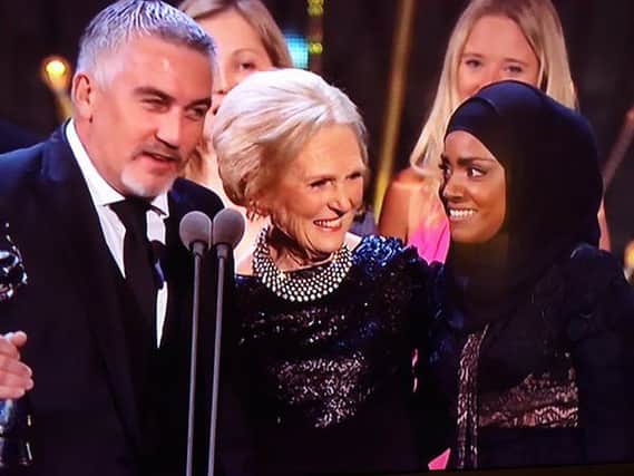Nadiya Hussain picks up a National Television Award alongside GBBO's Mary Berry and Paul Hollywood