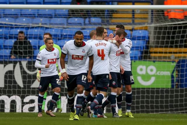 Bolton Wanderers celebrate Bolton Wanderers defender Robert Holding goal during the Sky Bet Championship match between Bolton Wanderers and Milton Keynes Dons at the Macron Stadium, Bolton, England on 23 January 2016. Photo by Simon Davies. PNL-160123-161013006