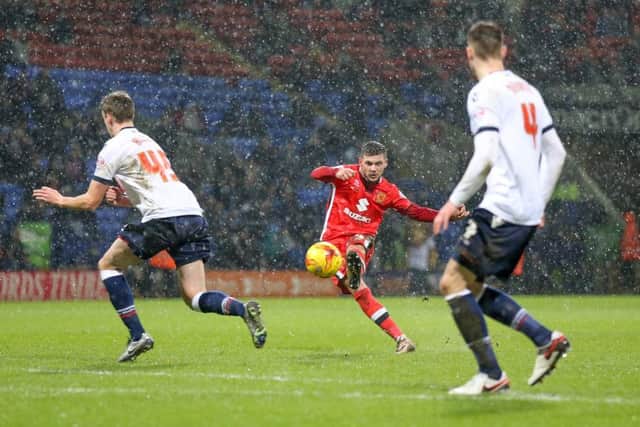 MK Dons midfielder, on loan from Brighton & Hove Albion, Jake Forster-Caskey  with a shot during the Sky Bet Championship match between Bolton Wanderers and Milton Keynes Dons at the Macron Stadium, Bolton, England on 23 January 2016. Photo by Simon Davies. PNL-160123-224146002