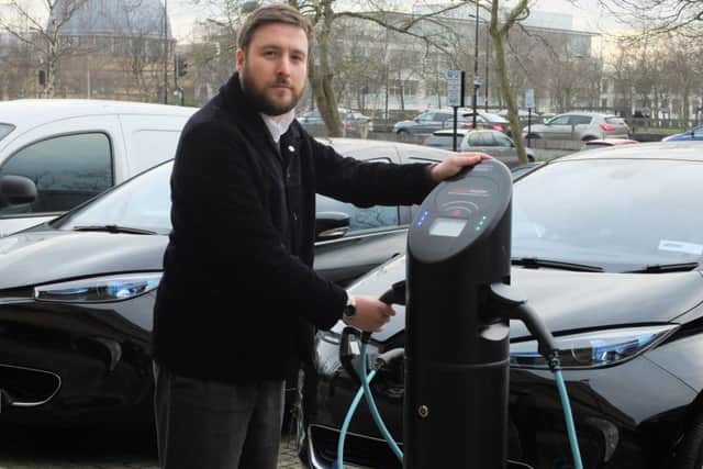 MK Council leader Pete Marland at a charging point