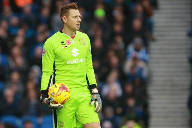 MK Dons goalkeeper David Martin during the Sky Bet Championship match between Brighton and Hove Albion and Milton Keynes Dons at the American Express Community Stadium, Brighton and Hove, England on 7 November 2015. Photo by Bennett Dean. PSI-1119-0046