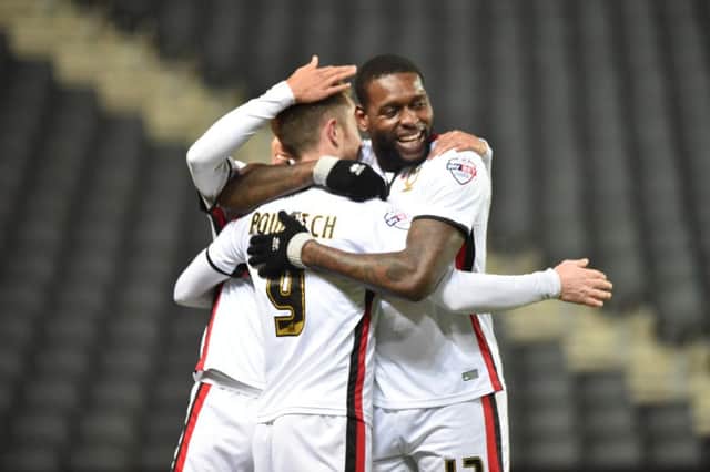 MK Dons celebrate Dean Bowditch's goal against Middlesbrough on Tuesday PNL-161202-173251002