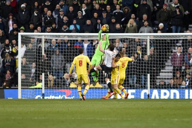 MK Dons goalkeeper David Martin makes a save during the Sky Bet Championship match between Derby County and Milton Keynes Dons at the iPro Stadium, Derby, England on 13 February 2016. Photo by Jon Hobley. PNL-160213-225626002