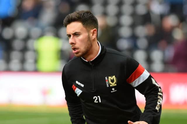 MK Dons defender George Baldock warms up ahead of the Sky Bet Championship match between Derby County and Milton Keynes Dons at the iPro Stadium, Derby, England on 13 February 2016. Photo by Jon Hobley. PSI-1557-0050