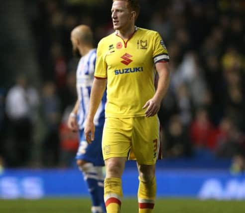 Milton Keynes Dons defender Dean Lewington (3) during the Sky Bet Championship match between Brighton and Hove Albion and Milton Keynes Dons at the American Express Community Stadium, Brighton and Hove, England on 7 November 2015. PSI-1118-0070