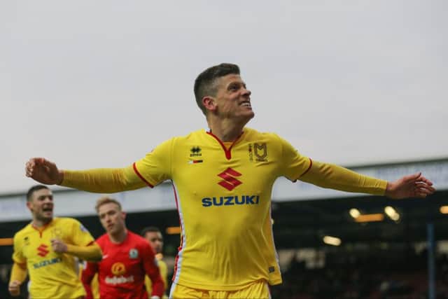MK Dons forward Alex Revell (18) scores for MK Dons  during the Sky Bet Championship match between Blackburn Rovers and Milton Keynes Dons at Ewood Park, Blackburn, England on 27 February 2016. Photo by Simon Davies. PNL-160227-180818002
